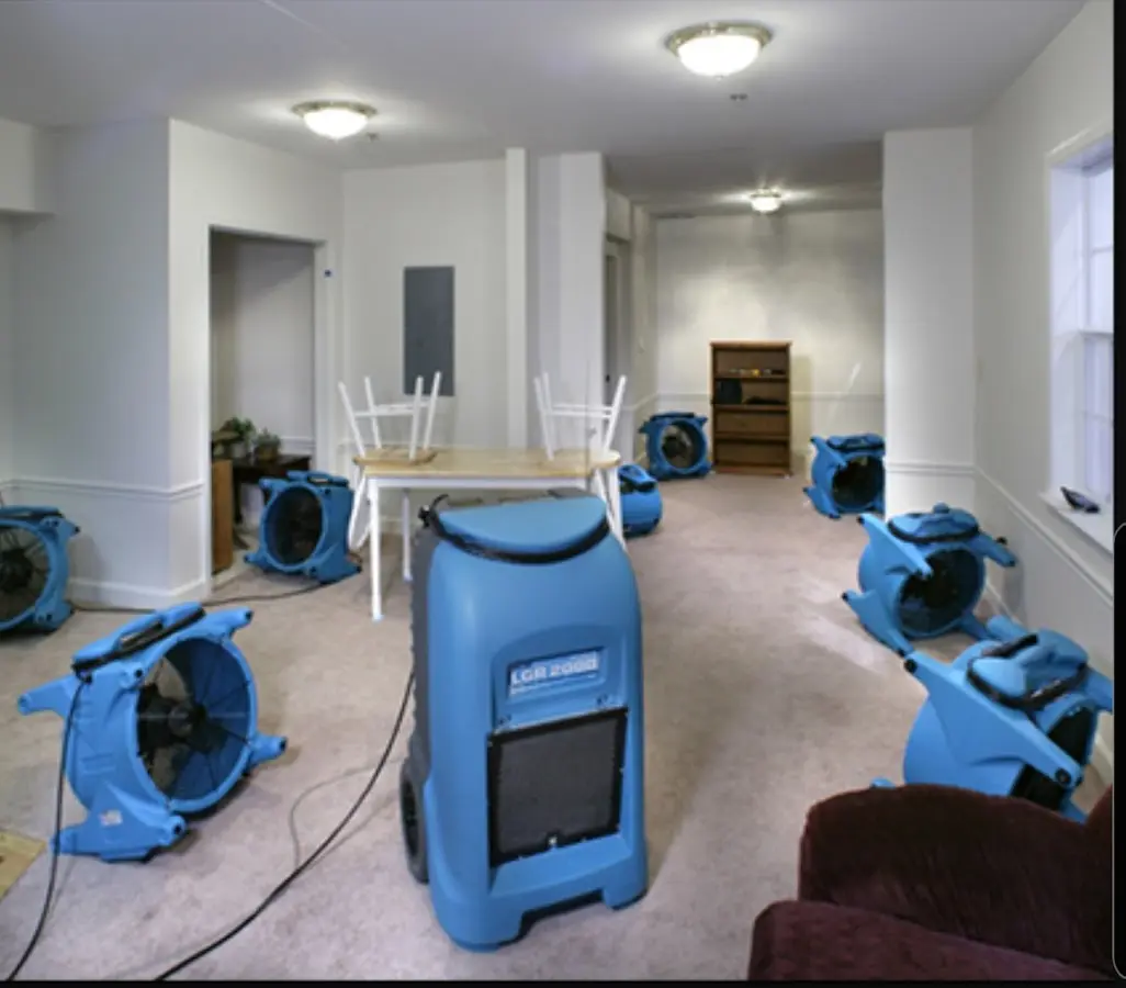 Air movers and dehumidifier setup for Water Damage Restoration in Mitchellville